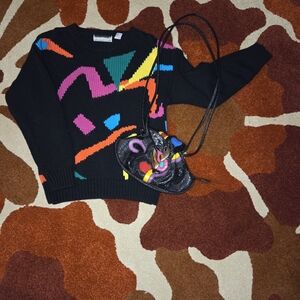 Colorful Patterned Sweater with Black Crossbody Bag